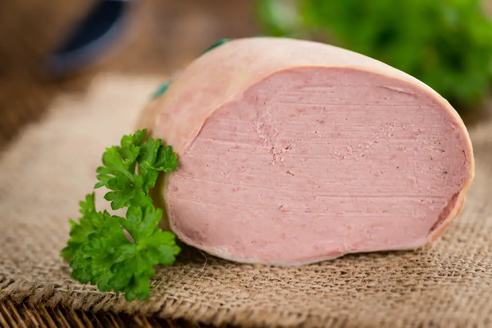 raw, uncooked and cut liverwurst