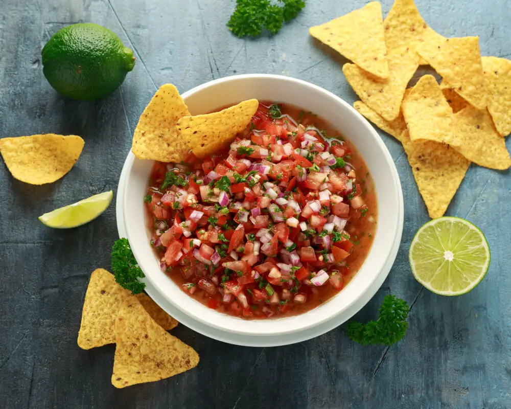 top view of salsa in a white bowl