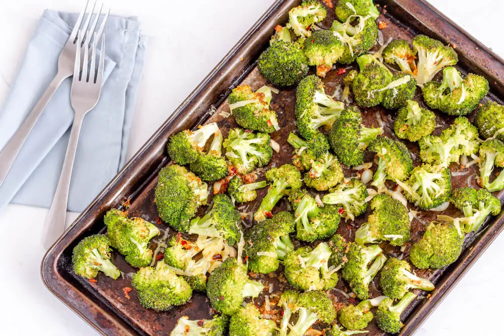 top view of roasted broccoli kept in a tray 