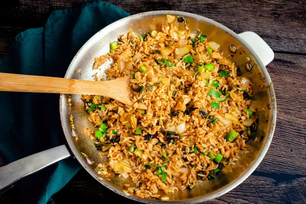 reheating fried rice in a skillet