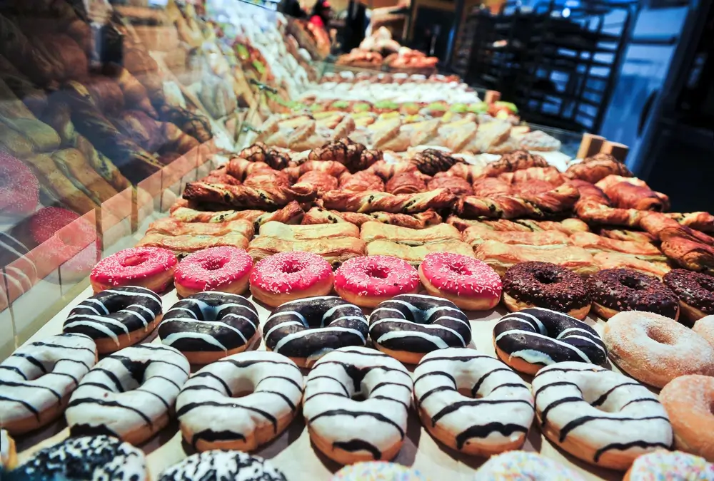 donuts arranged in a shelf